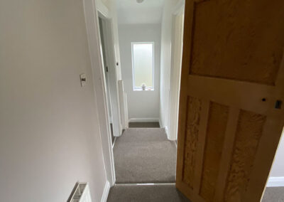 Grey carpet fitted in bedroom and hallway